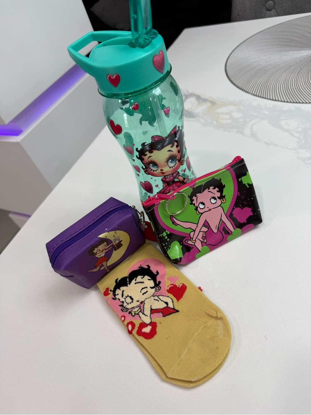 Betty boot bundle two pouches, a pair of socks, and a water bottle all new